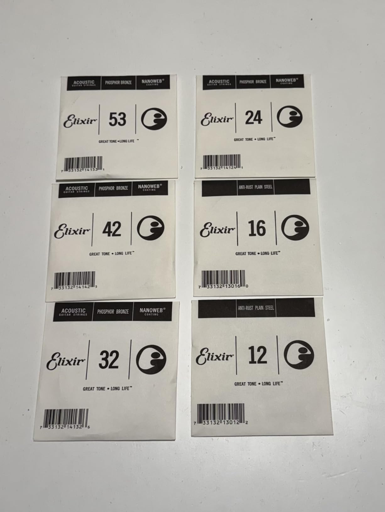 Elixir Strings, Acoustic Guitar Strings, Phosphor Bronze with NANOWEB Technology, Longest-Lasting Rich and Full Tone For Life with Comfortable Feel, 6 String Set, Light 12-53 customer photo 2