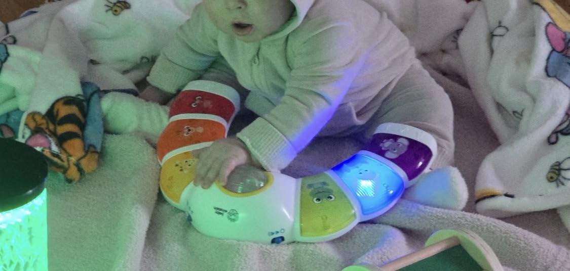 Baby Einstein Glow & Discover Light Bar Musical Toy, Activity Station, Sitting Up and Tummy Time Toy customer photo 1