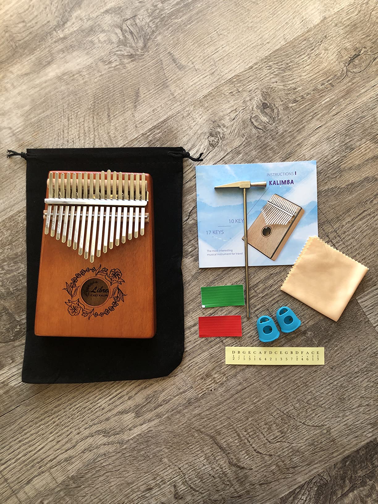 Libretto Kalimba Solid Wood Thumb Piano 17 Keys, Portable Mbira Finger Piano with Tune Hammer, Flannel Bag, Manual, Cleaning Cloth, Finger Covers, and Stickers, Great Gift for Kids and Adult Beginners customer photo 1