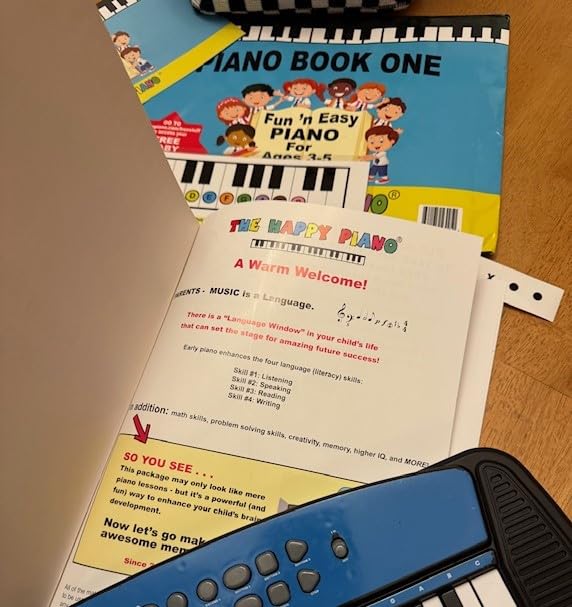 The HAPPY PIANO KIT-Preschoolers Book & Color Keyboard Stickers w/QR Codes. in preschools Across USA! Kids Toddlers 3-5. Easy! Beginner Music, Baby Shark Lesson Video (Digital). 50K Kids Since 2006! customer photo 2