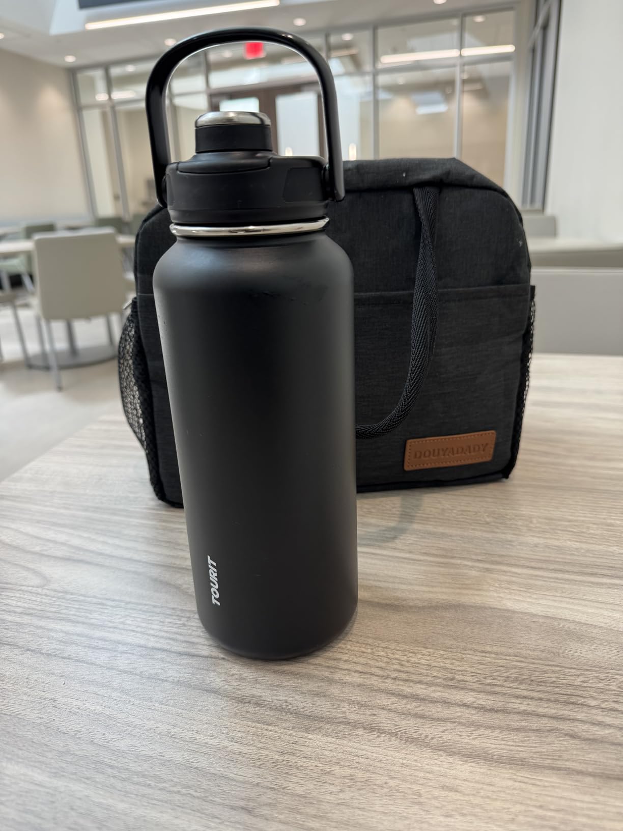 TOURIT 24 oz Insulated Stainless Steel Water Bottle, Obsidian | Double-wall vacuum thermal flask with top handle, leakproof & BPA-free design for sports, gym, hiking & travel use customer photo 1