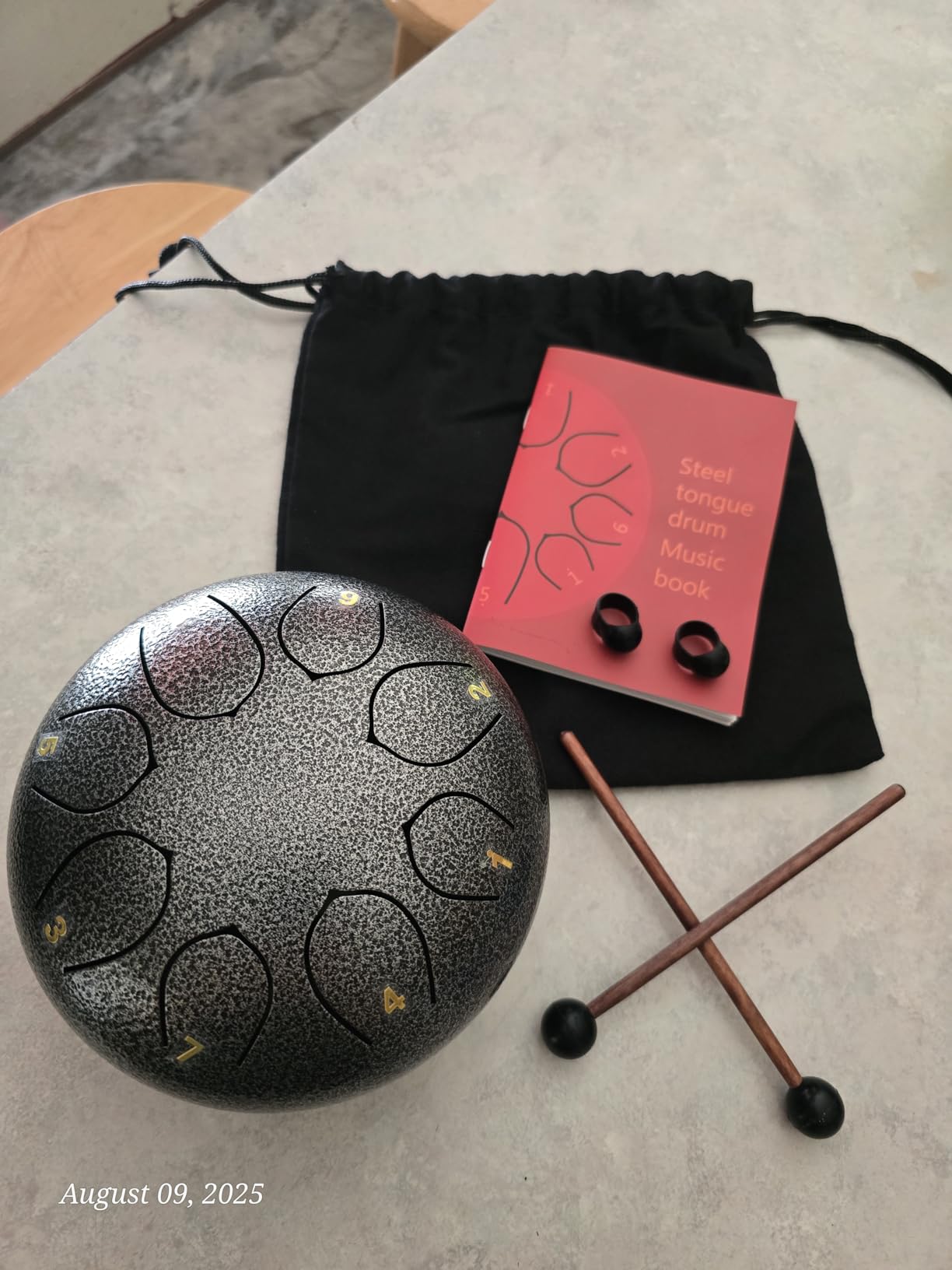 Steel Tongue Drum C Major - 12 Inch 13 Note Rain Drum for Outdoor, Garden Meditation, Sound Healing, Yoga - Handpan Drum with Mallets, Music Book, Finger Picks & Carry Bag customer photo 2