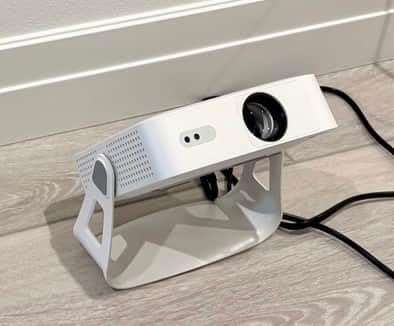 [Officially-Licensed App & Auto Focus]White Smart Mini Projector with WiFi and Bluetooth, XuanPad 4K Support Movie Projector, Portable Native 1080P Outdoor Projector with 360° Stand customer photo 1
